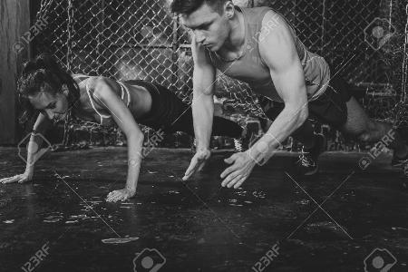 Two men doing clap push ups